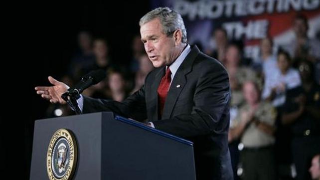  President George W. Bush gestures as he addresses an audience 