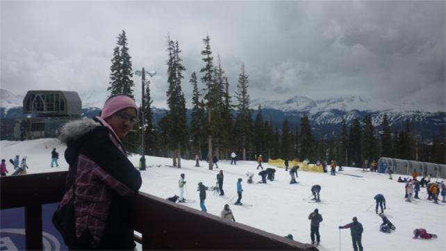 mountain top with skiers