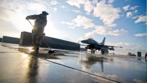 Sweeping up debris at Bagram Air Base, Afghanistan